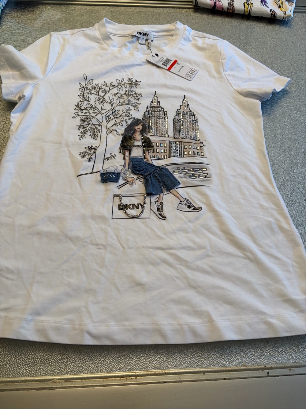DKNY White Tee with Black Outline Cityscape & Tree Graphic